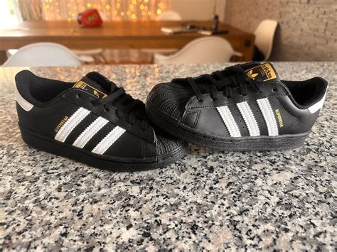 adidas supersatrs schwarz mit weissen streifen unisex|Adidas Superstar blau.